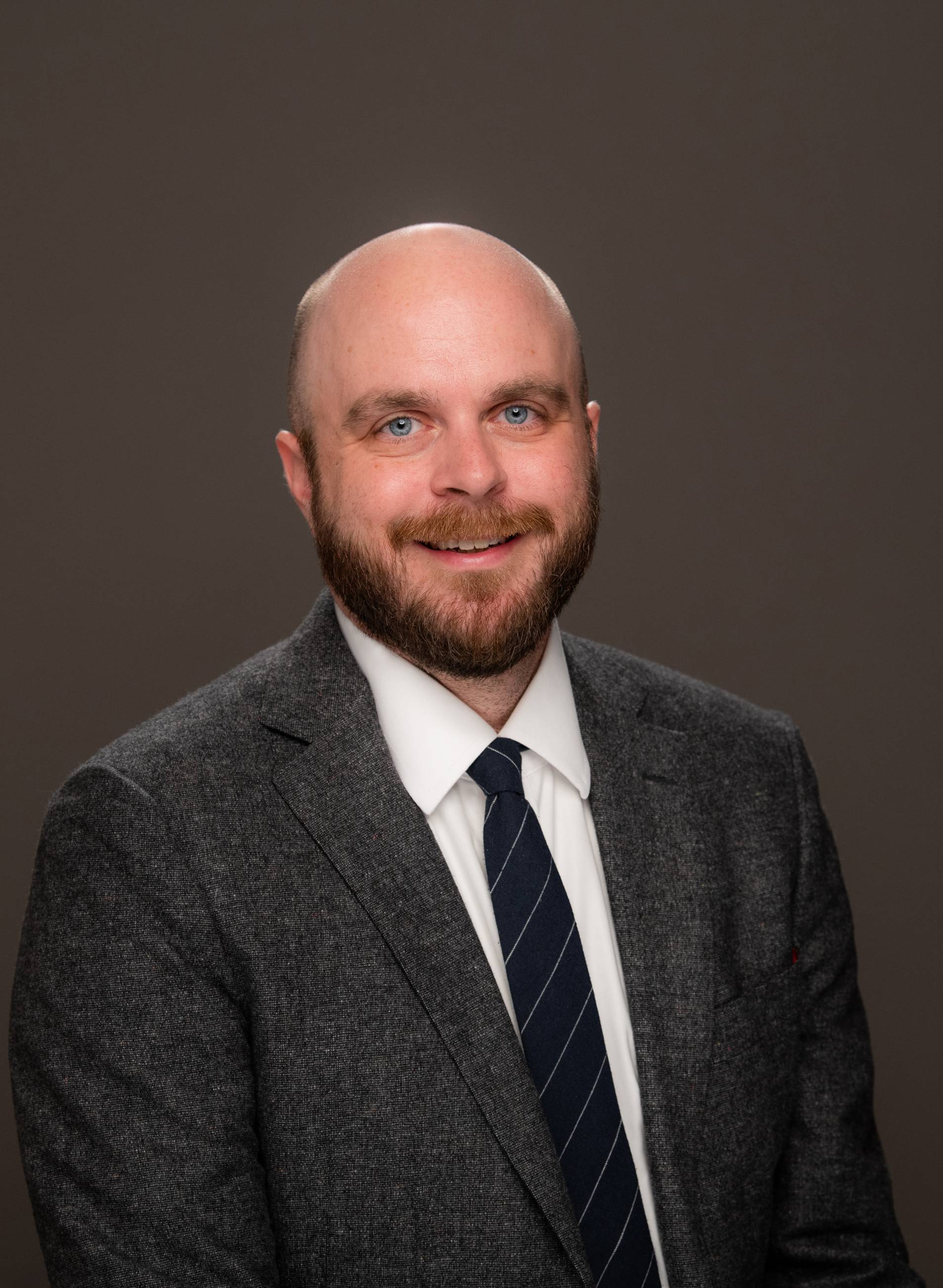 Headshot of Justin Melick